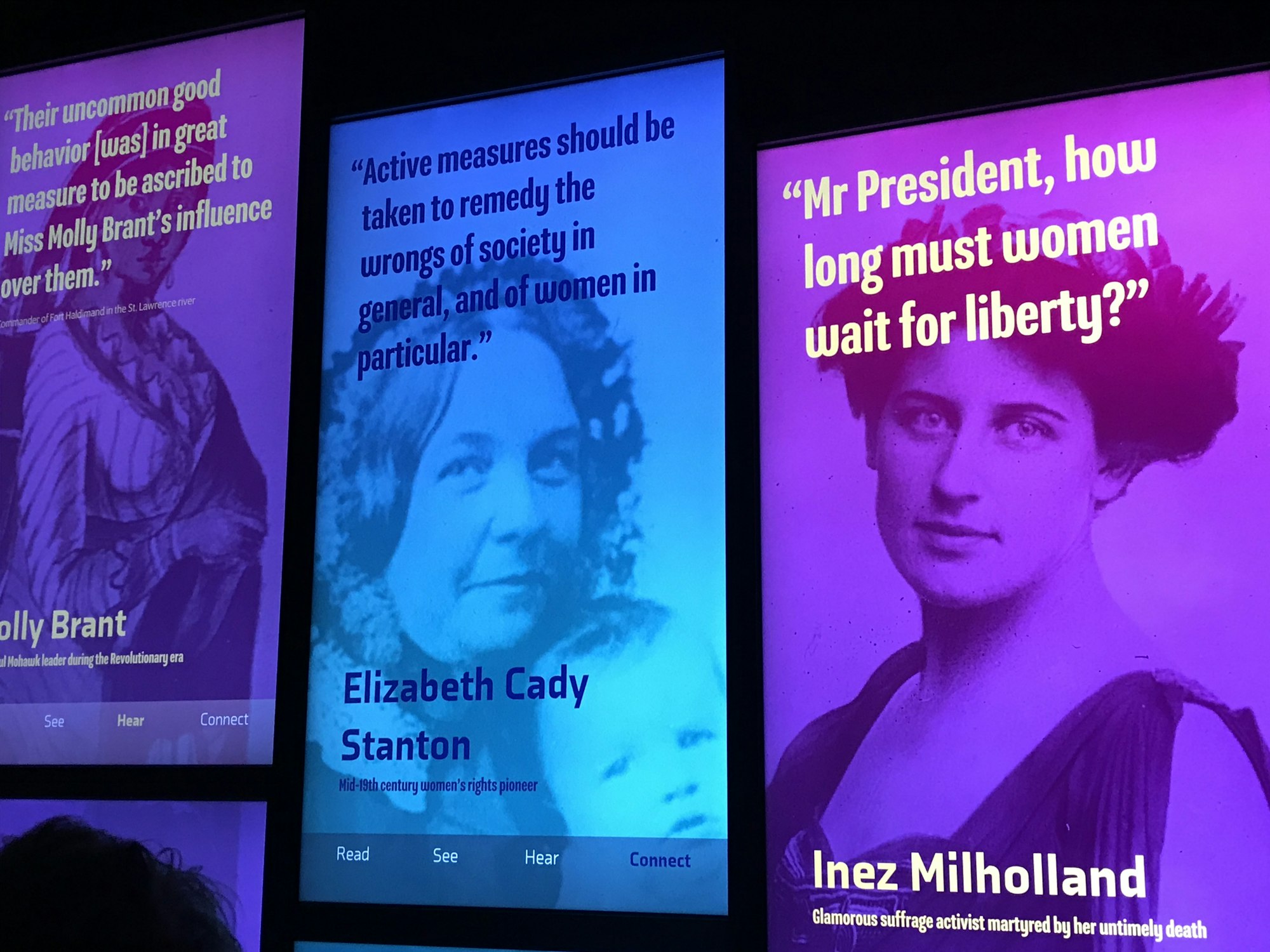 An image of the Women's Voices multimedia interactive on the 4th floor featuring Inez Milholland, Elizabeth Cady Stanton and more.