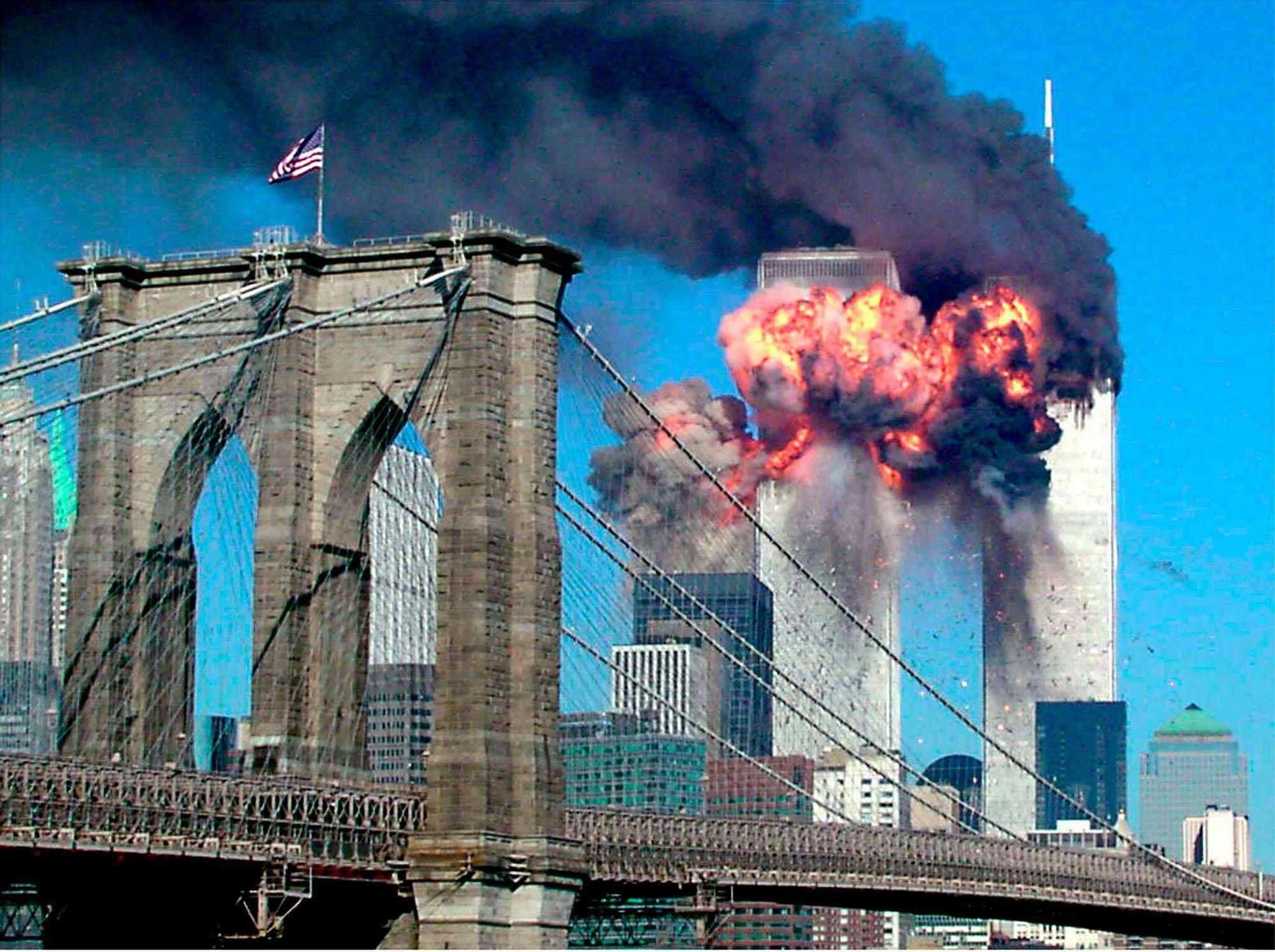 Sara K. Schwittek/Reuters. The second tower of the World Trade Center bursts into flames after being hit by a hijacked airplane, September 11, 2001. Alamy, 2D3NJND.