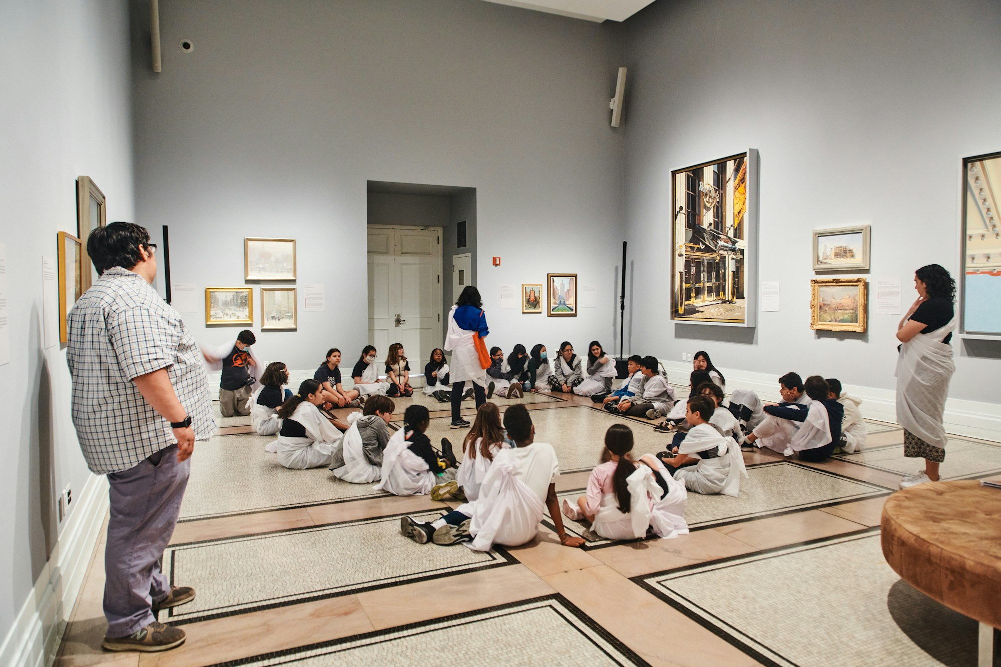 A class of students learning in one of our museum galleries.
