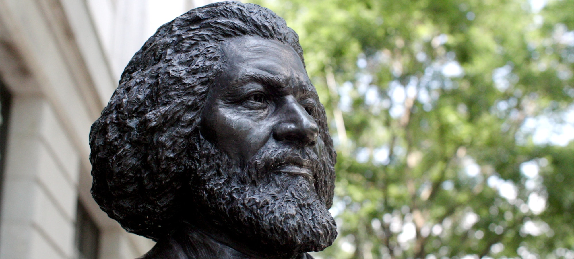 a close-up of the face of the Frederick Douglass statue on 77th st.