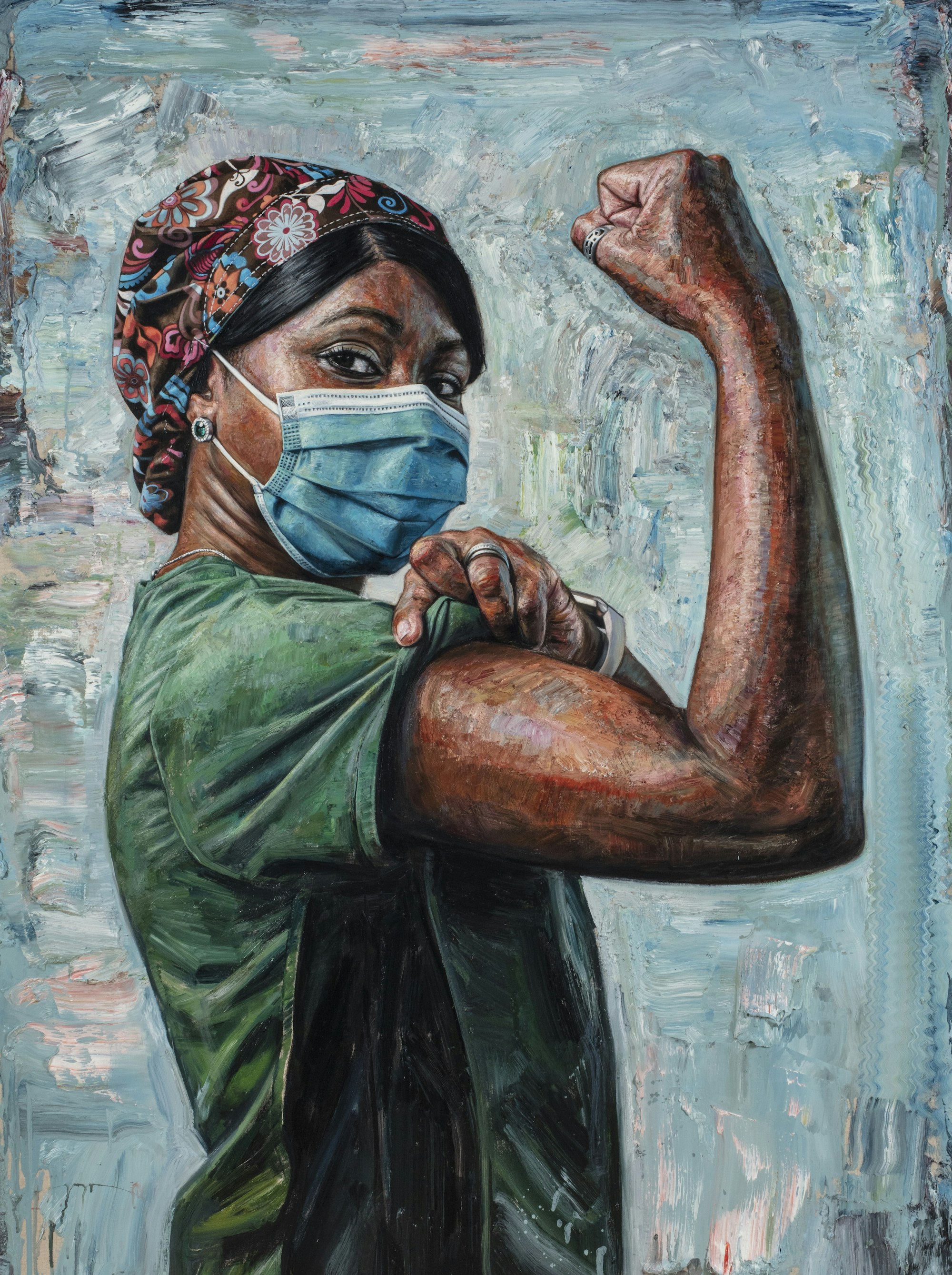 Tim Okamura's painting Nurse Tracey showing a Black nurse wearing a mask and posing as Rosie the Riveter