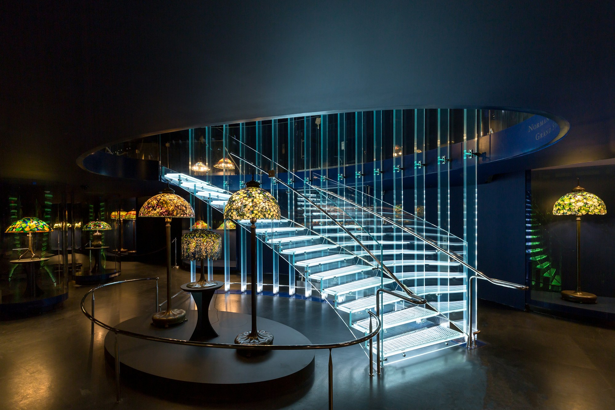 the staircase in the gallery of tiffany lamps
