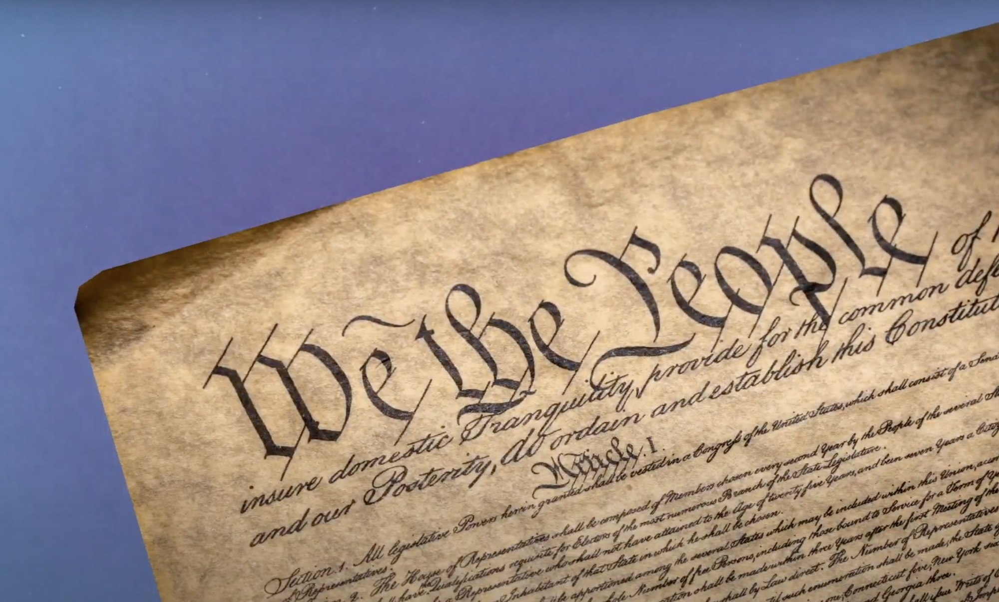 A still from an educational video featuring the preamble to the constitution