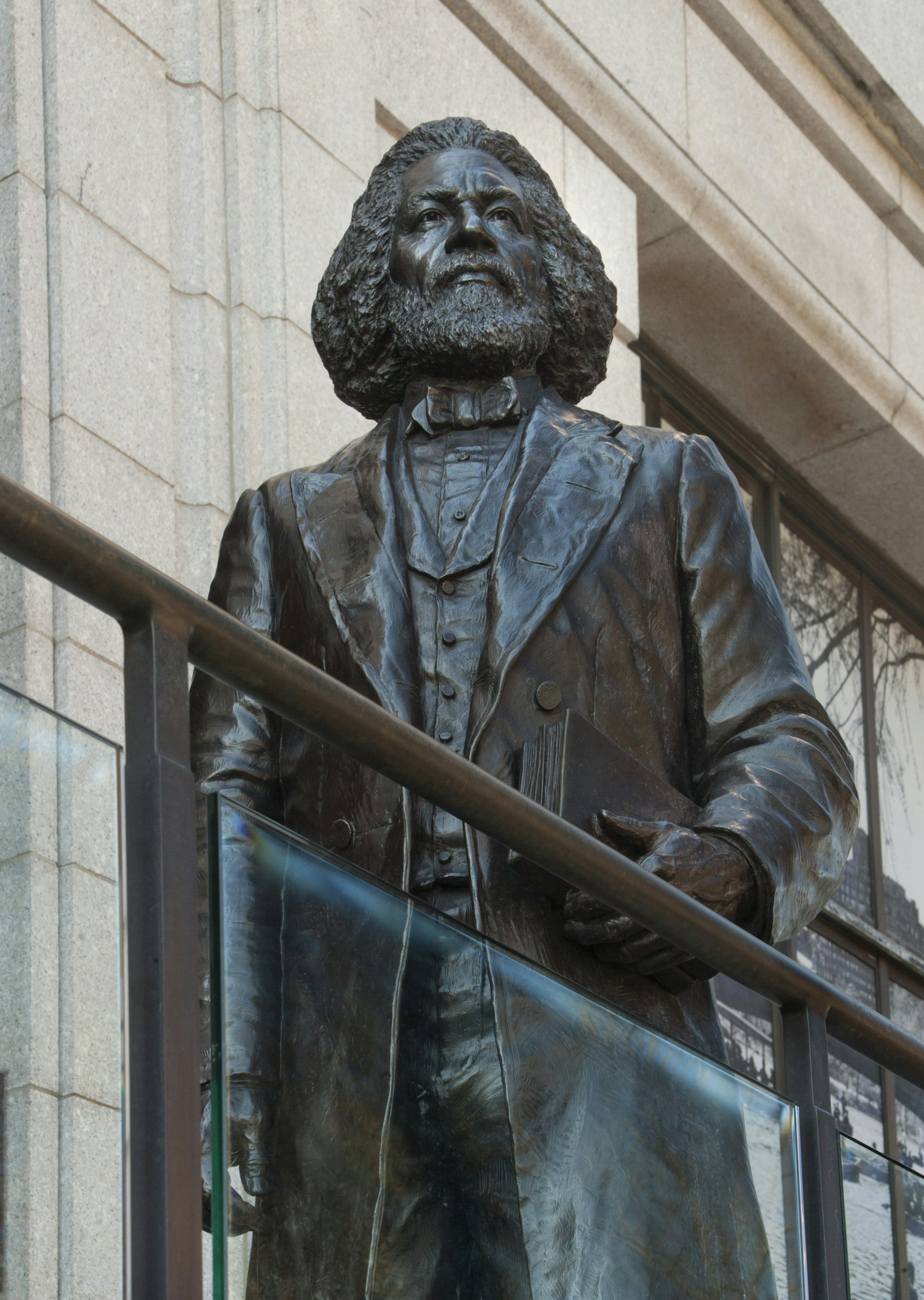 the frederick douglass statue that sits outside the 77th st. entrance.