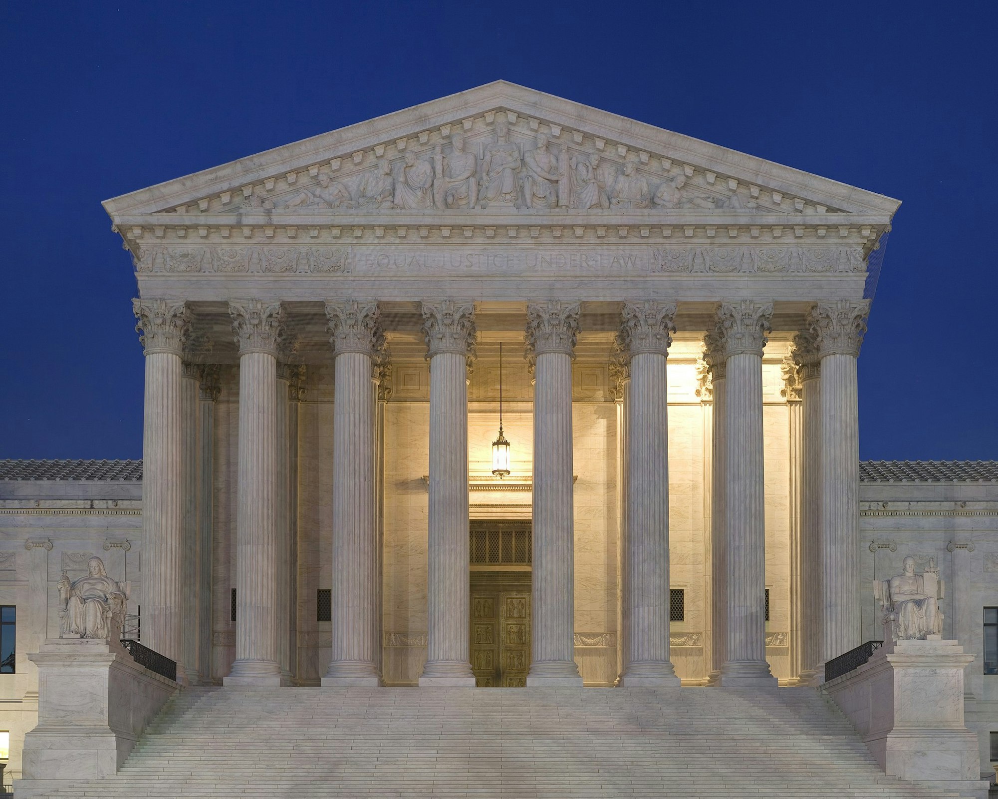 a photo of the Supreme Court building at dusk