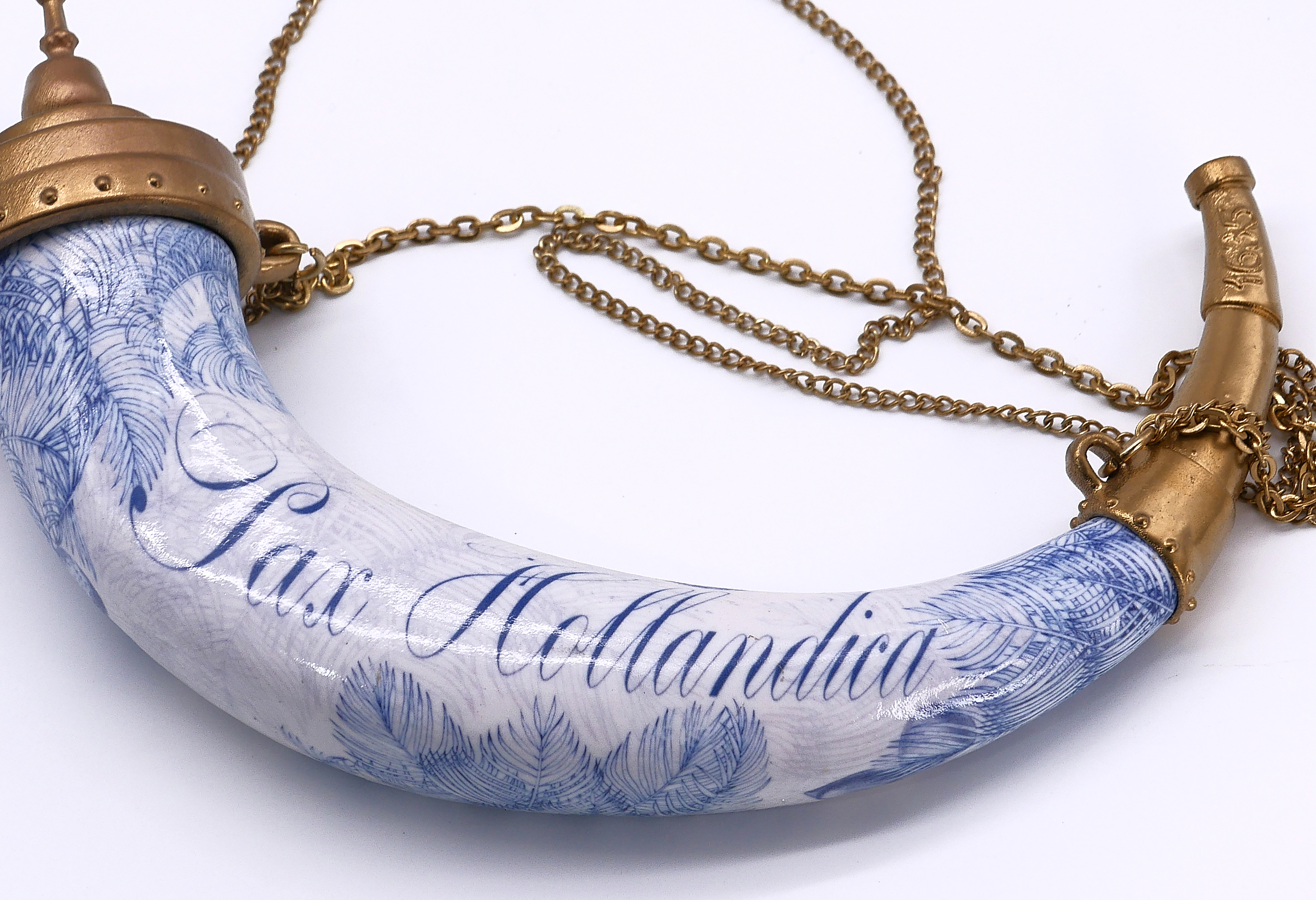 a horn with blue and white imprints and the words "Pax Hollandia