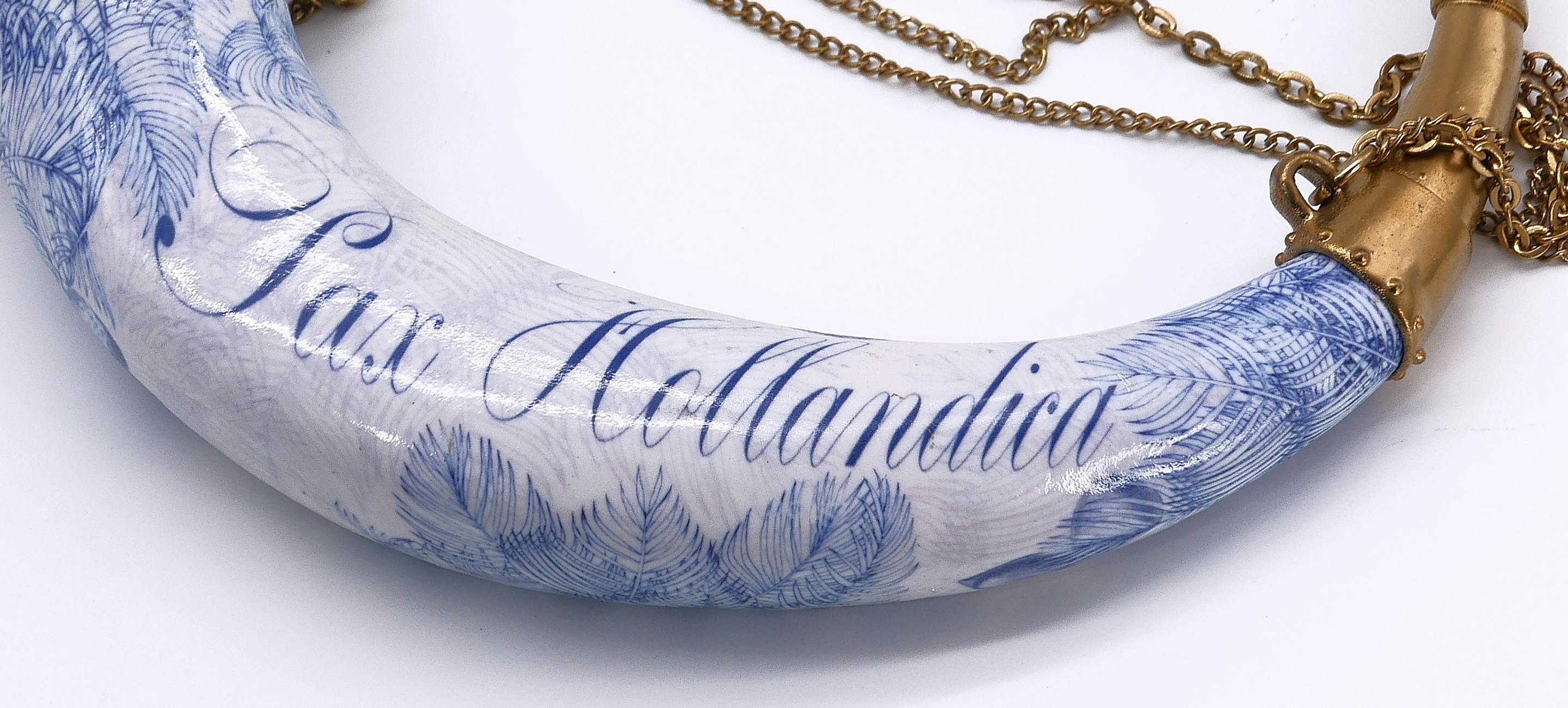a horn with blue and white imprints and the words "Pax Hollandia