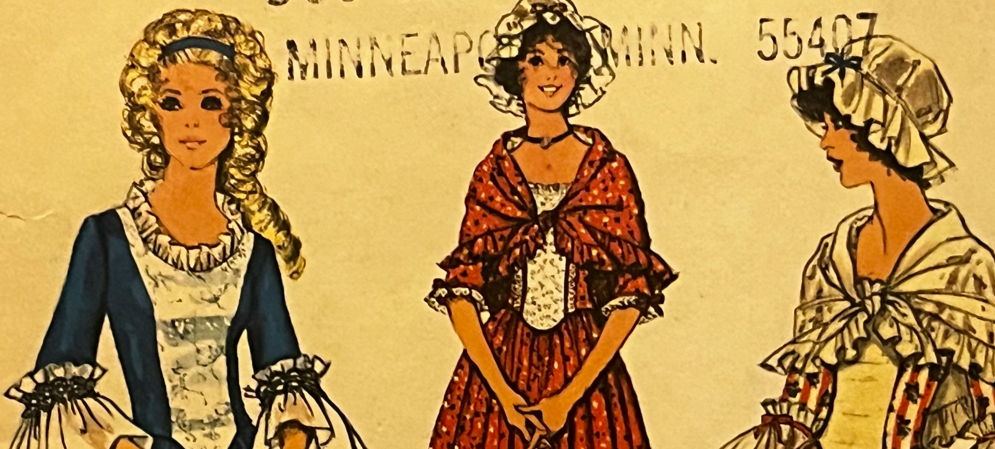 the packaging of a dress pattern showing three women in Revolutionary-era dresses
