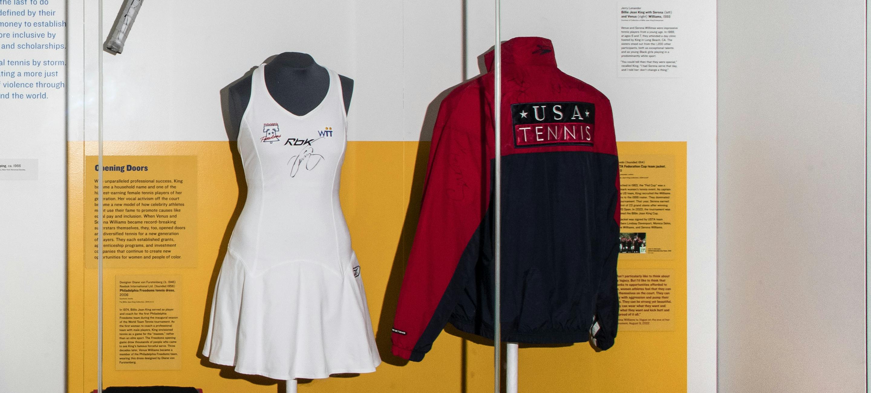 detail from the generating star power installation showing a tennis racket and tennis dress and jacket related to Billie Jean King.