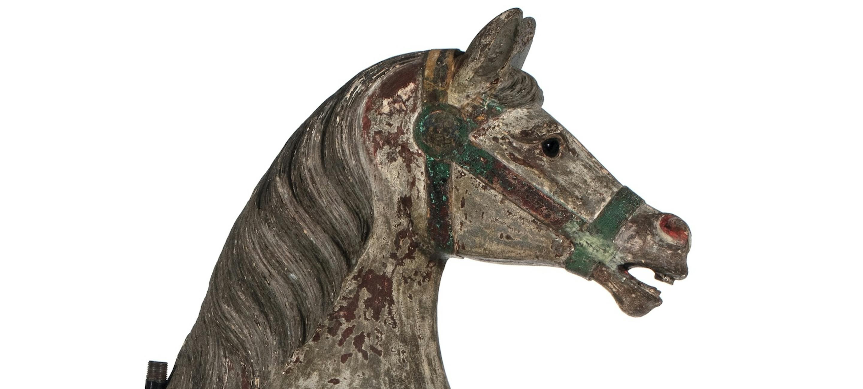 a weathered carousel horse
