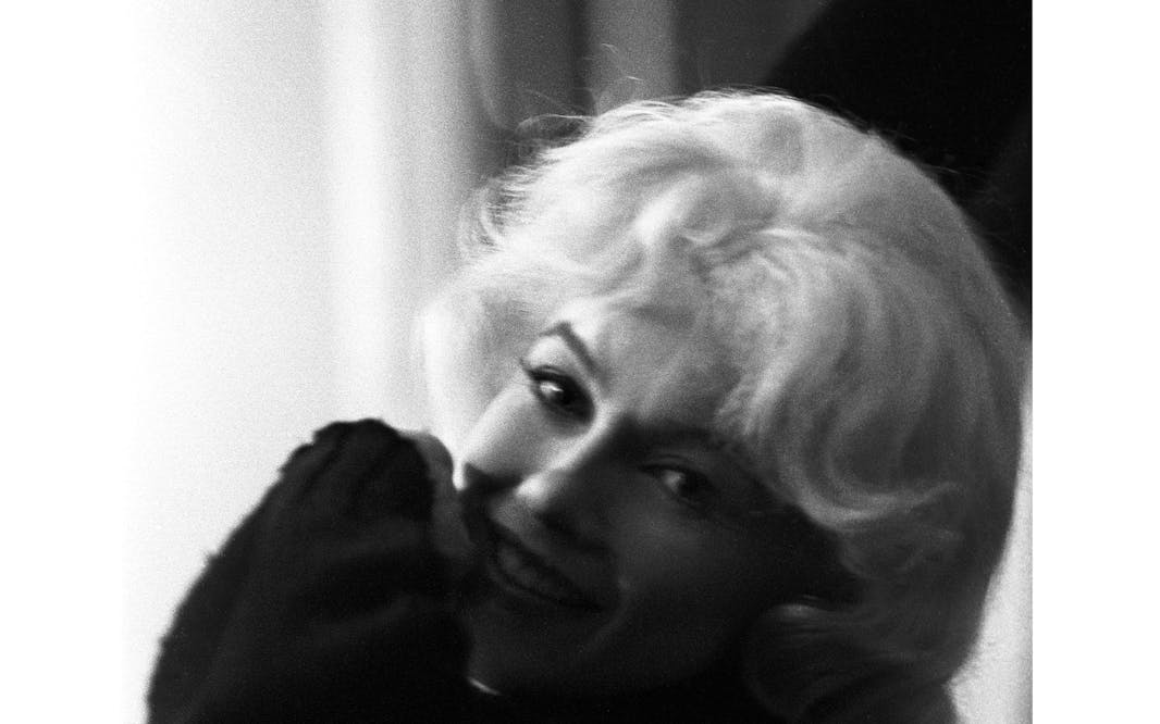 black and white image of Marilyn Monroe with her face half in shadow
Lawrence Schiller (b. 1936), Marilyn Monroe, Let’s Make Love, 20th Century Fox Studios, Los Angeles, September 1960