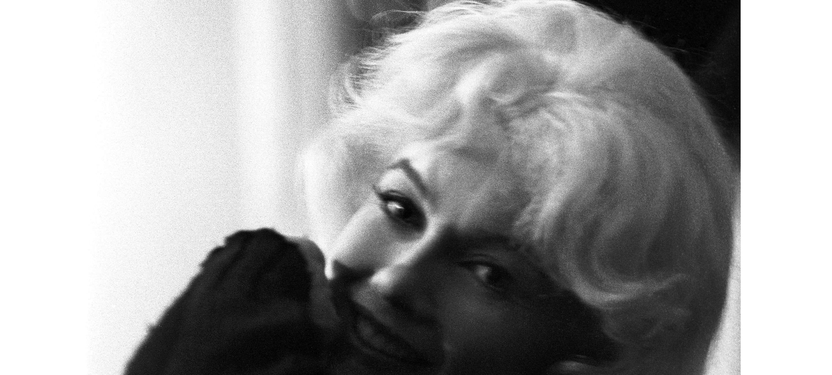 black and white image of Marilyn Monroe with her face half in shadow
Lawrence Schiller (b. 1936), Marilyn Monroe, Let’s Make Love, 20th Century Fox Studios, Los Angeles, September 1960