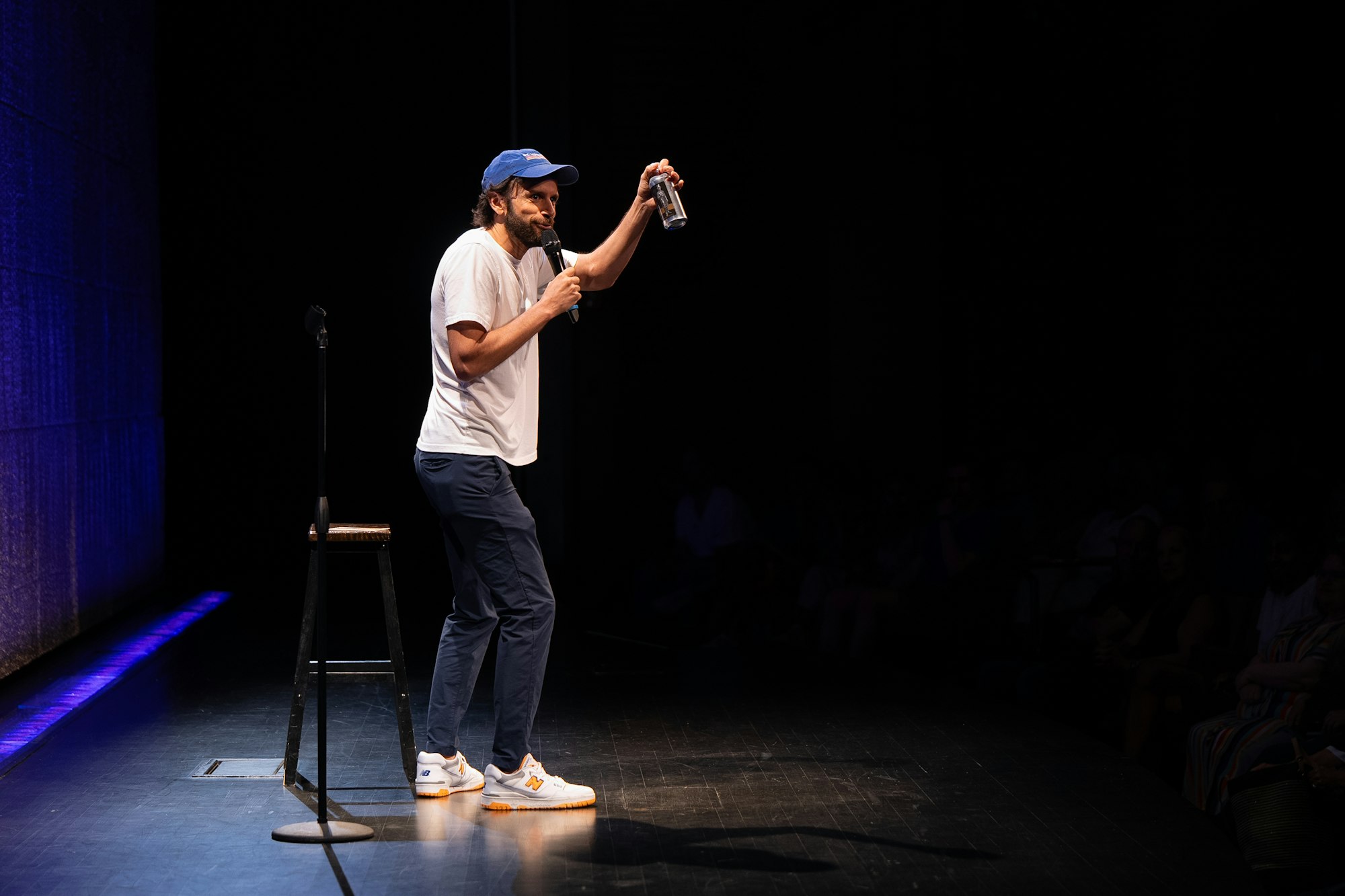 Tom Delgado onstage in the auditorium during a comedy show