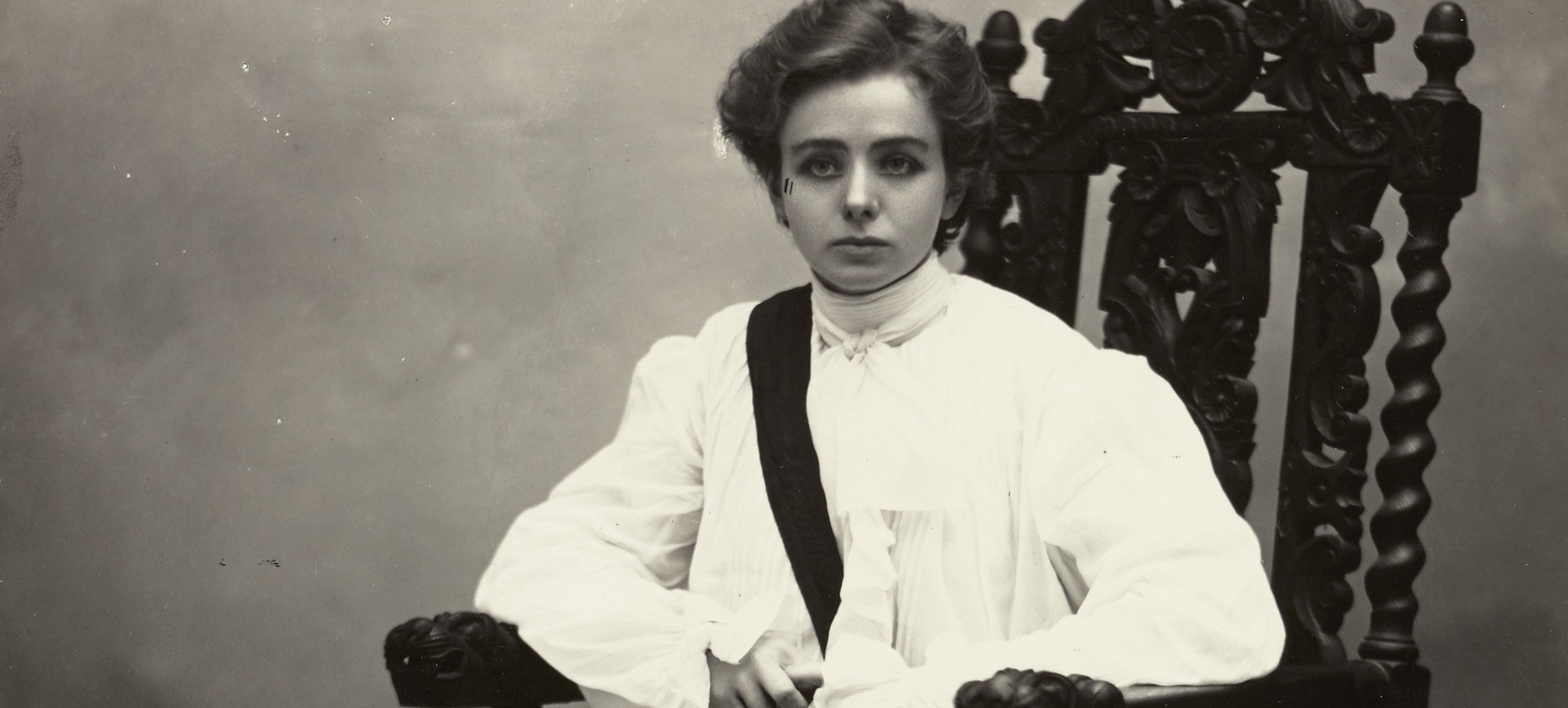 The actress Maude Adams in costume sitting on an elaborate wooden chair and looking forward
Unidentified photographer. Maude Adams in costume, L’Aiglon, ca. 1901. Gelatin silver print. Patricia D. Klingenstein Library, The New York Historical