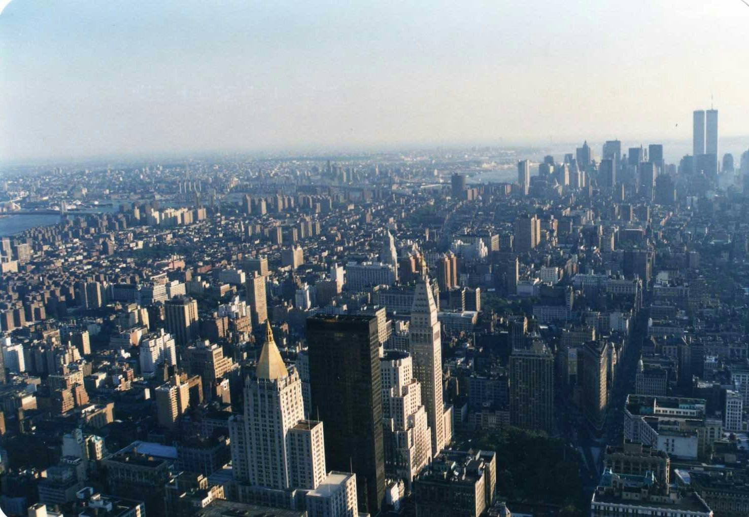 Skyline of New York City looking downtown with the twin towers of the original world trade center in the distance on the right. 1987. Public domain