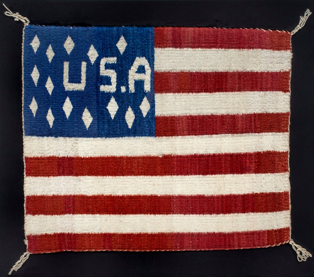 Diné Weaver, USA flag, late 19th century. Handspun wool, vegetal and native dyes. The New York Historical, Promised gift of Agnes Hsu-Tang and Oscar Tang, The Hsu-Tang Collection