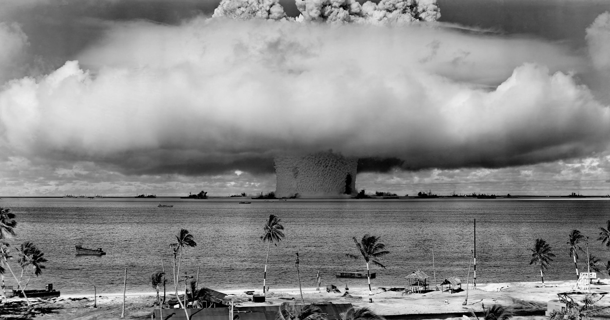 The "Baker" explosion, part of Operation Crossroads, a nuclear weapon test by the United States military at Bikini Atoll, Micronesia, on 25 July 1946. The wider, exterior cloud is actually just a condensation cloud caused by the Wilson chamber effect, and was very brief. United States Department of Defense