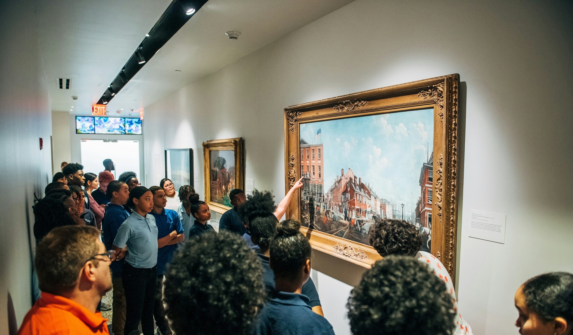 Students examine original works of art as part of the Academy.