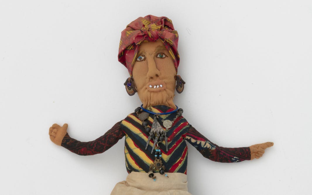 A Betye Saar artwork of a hoo doo woman made of mixed fabric, leather, metal, and beads. Betye Saar (b. 1926), Hoo Doo Woman, 1974. Mixed fabrics, metal jewelry, leather, beads. Courtesy of the artist and Roberts Projects Los Angeles, California. Photo: Robert Wedemeyer