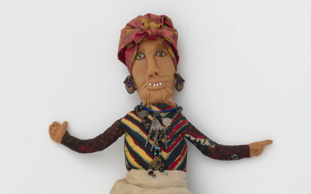 A Betye Saar artwork of a hoo doo woman made of mixed fabric, leather, metal, and beads. Betye Saar (b. 1926), Hoo Doo Woman, 1974. Mixed fabrics, metal jewelry, leather, beads. Courtesy of the artist and Roberts Projects Los Angeles, California. Photo: Robert Wedemeyer