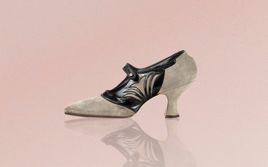 A grey suede high-heeled Mary Jane shoe with black leather around the mid foot
C. Sautter’s Sons, maker
Pointed-toe Mary Jane shoes, ca. 1916
New York City
Suede, leather
Gift of Stuart Weitzman, 2025.25.570ab