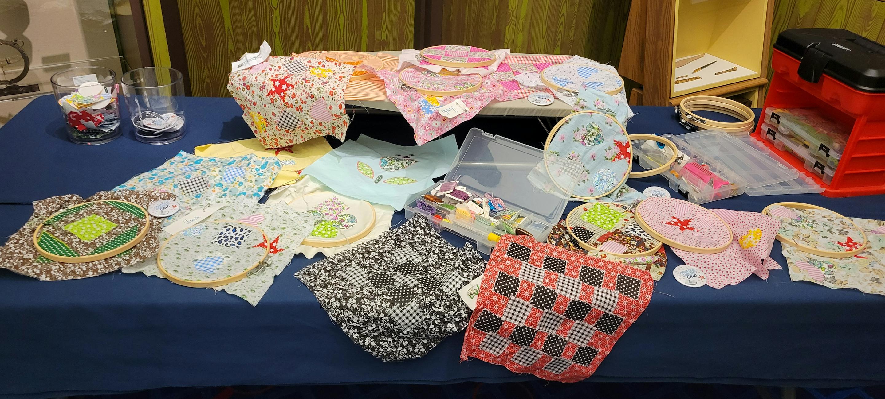 table with handmade sewing craft