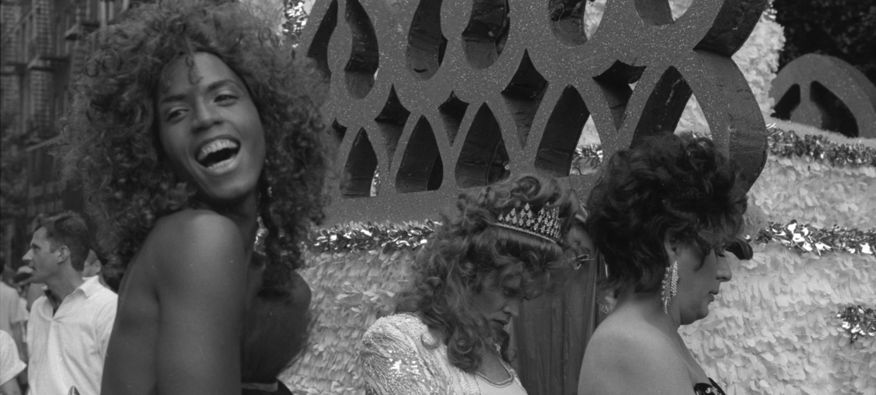 image of a 1994 Pride march in NYC, showing a laughing person on a Pride float with two other figures looking to the side.
Fred McDarrah (1926–2007) Untitled (Gay Pride Anniversary), New York City, June 26, 1994. Patricia D. Klingenstein Library, The New York Historical, Gift of the Goldman Sonnenfeldt Family