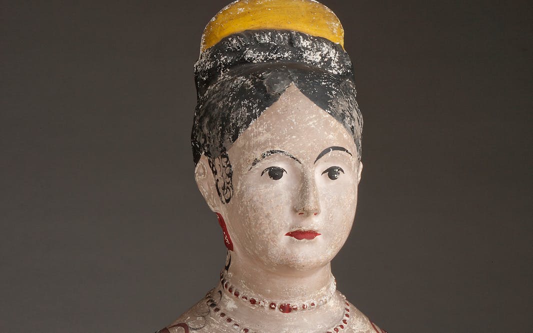 Chalkware bust of a woman with a yellow hat on her head
Unidentified American maker, Chalkware bust of a woman, ca. 1850. Painted plaster. The New York Historical, Purchased from Elie Nadelman, 1937.1138.