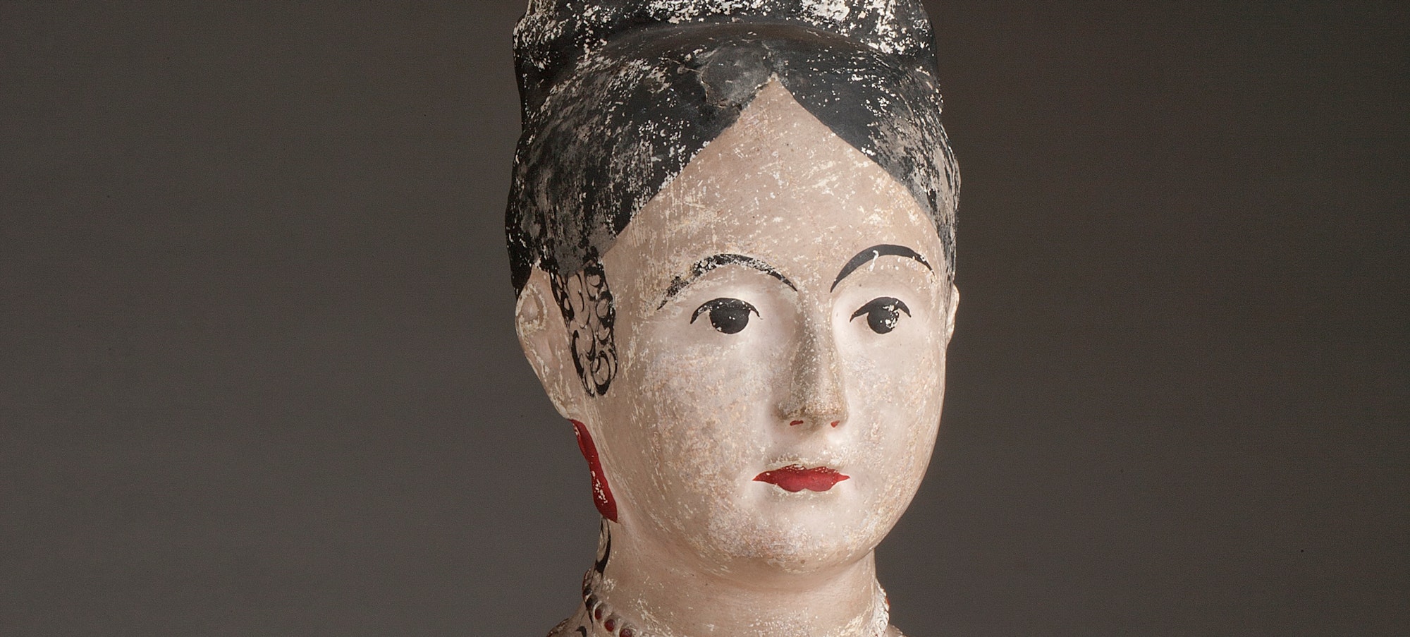 Chalkware bust of a woman with a yellow hat on her head
Unidentified American maker, Chalkware bust of a woman, ca. 1850. Painted plaster. The New York Historical, Purchased from Elie Nadelman, 1937.1138.
