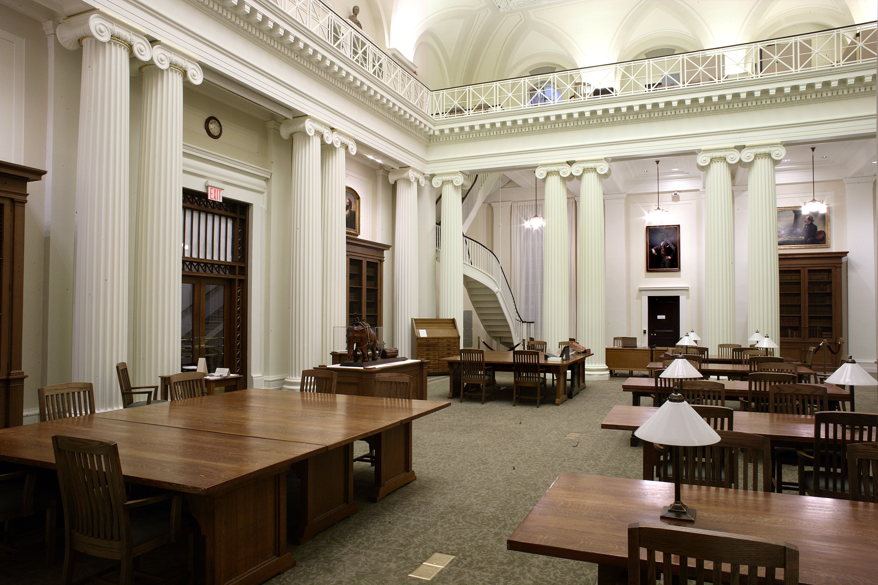 The reading room of the Patricia D. Klingenstein library featuring large wooden tables and chairs