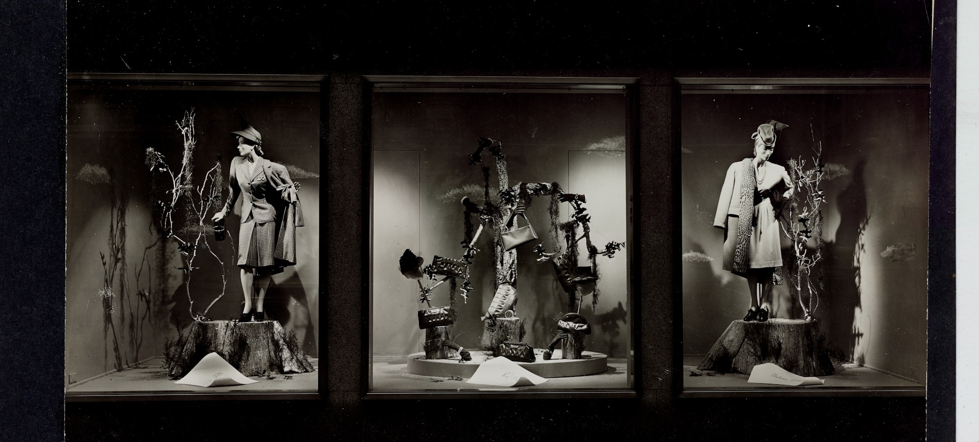Unidentified photographer. Window display of women's outerwear and purses at De Pinna Department Store, New York City, circa 1940–1959. Patricia D. Klingenstein Library, The New York Historical