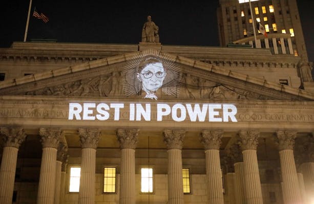 RBG image projected onto New York State Civil Supreme Court building in Manhattan, September 19, 2020. Courtesy Reuters/Andrew Kelly/Alamy Photo.