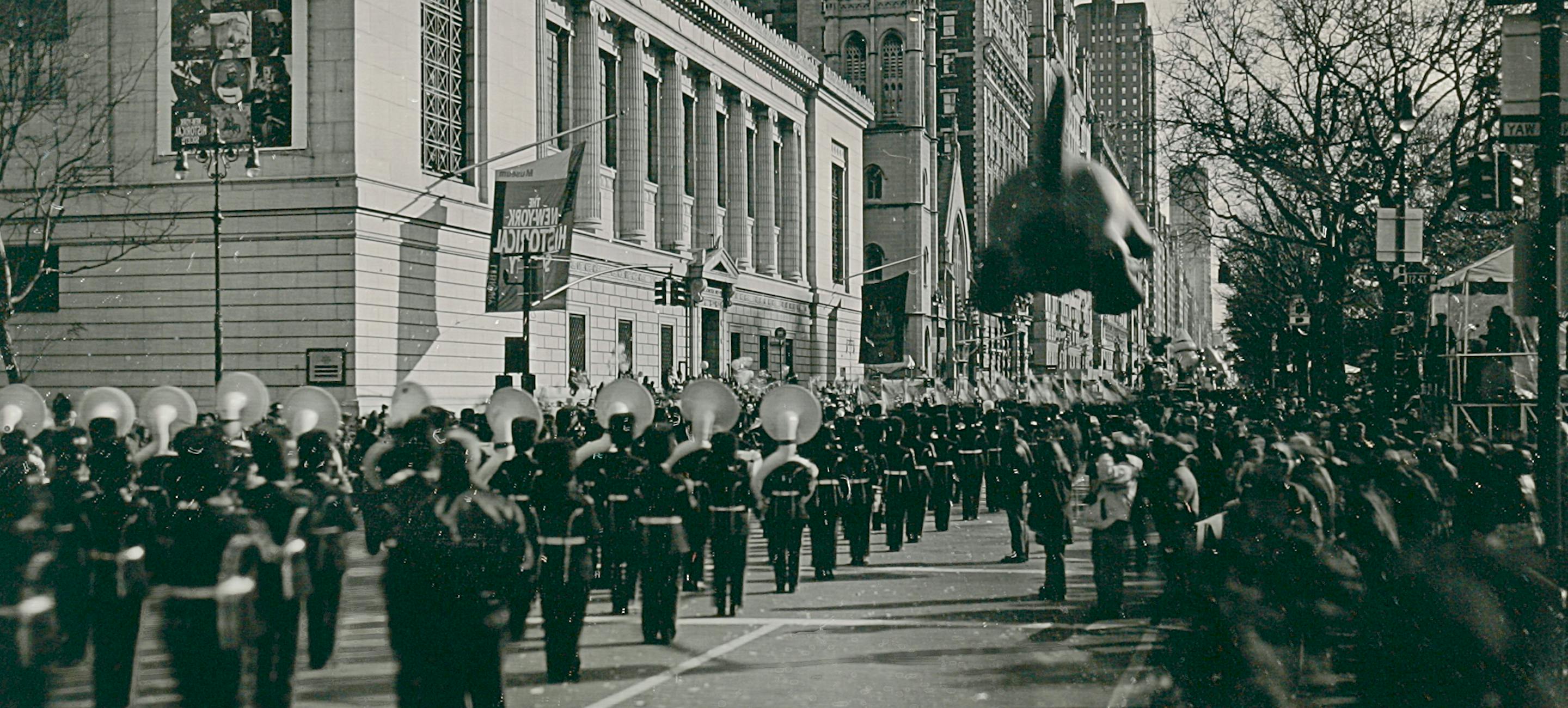 photo of the Macy's Thanksgiving Parade going down Central Park West in front of the New York Historical with a marching band in the foreground and a balloon in the distance.
Jerry Spagnoli (born 1956), Macy's Thanksgiving Day Parade, 2000. Daguerreotype. Patricia D. Klingenstein Library Collection, The New York Historical.